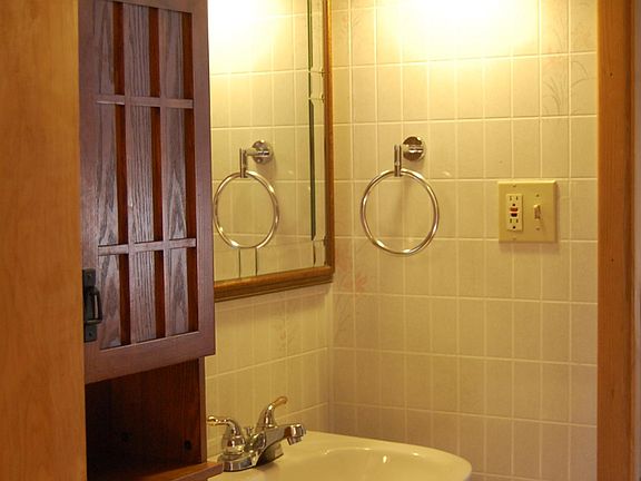 The bathroom includes two sinks