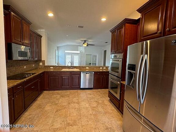 2nd image of 9688 WOODSTONE MILL Drive