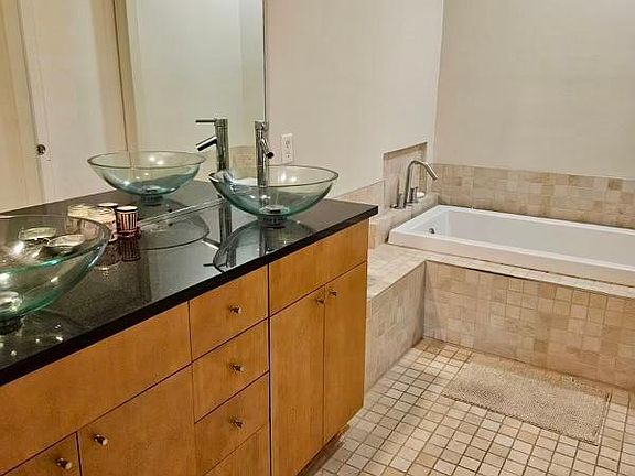 Master bath upstairs. Other bathrooms match style.