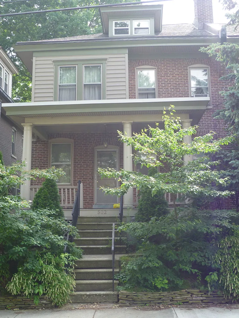 Home is landscaped with native plants. Parking available directly in front of home. Garage parking available behind house.
