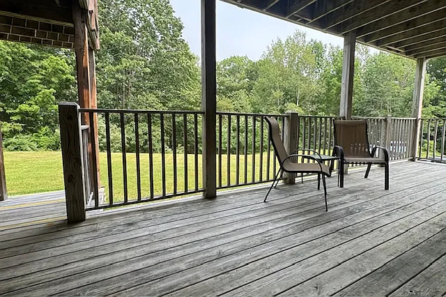 private deck, wooded view