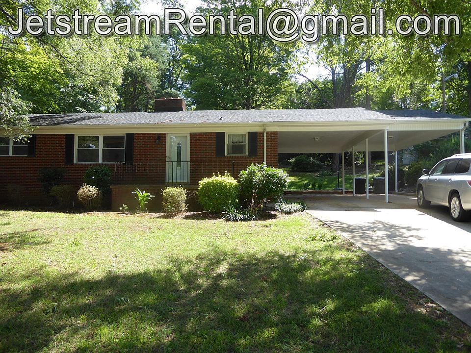 Front of home with double carport