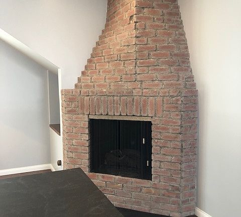 one of two gas fireplaces. This one is in the kitchen.
