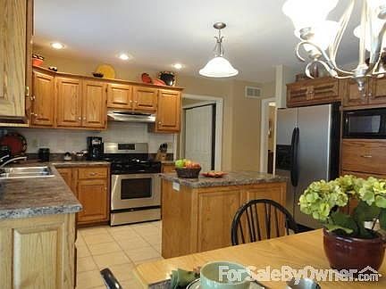 Kitchen
						:
						Custom Cabinets