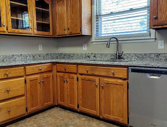 Lots of cabinet space and beautiful granite counter tops.