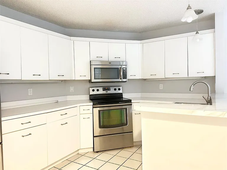 10461 NW 12th Ct — Photo 23