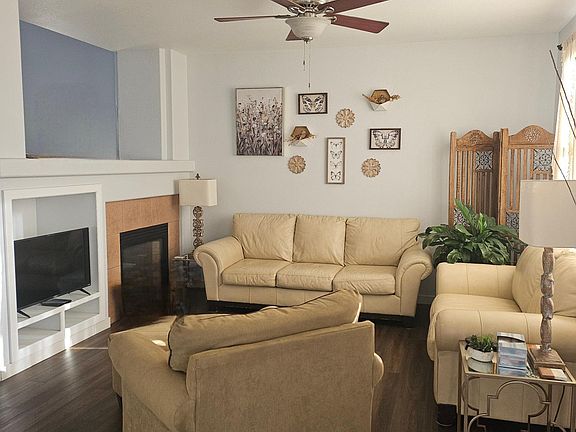 Living room with double sided fireplace