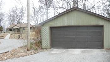 The large garage has two new garage doors.