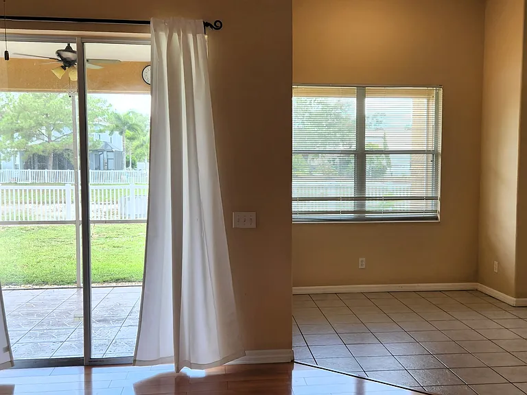 back part of the house view, with sliding door to the lanai