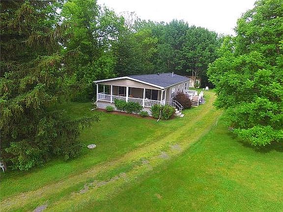 Grass and stone driveway 