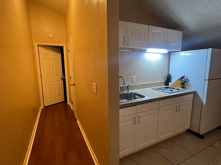 Hallway to bathroom/bedroom