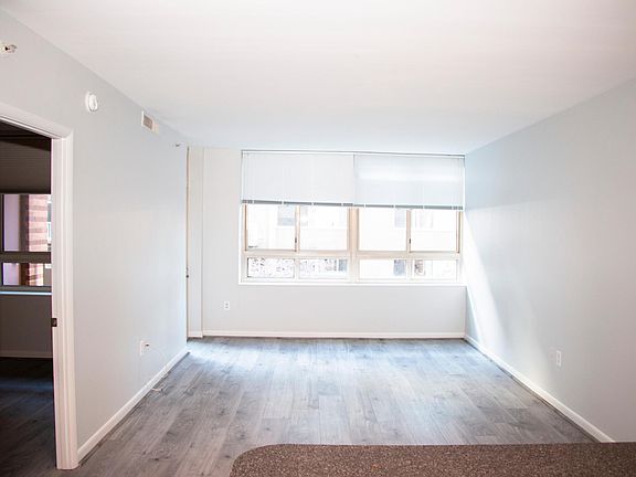 Open concept living space, with very spacious living room/kitchen.