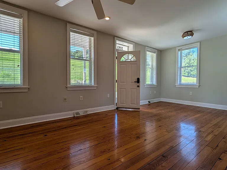 The first floor living space blends into the dining and kitchen area.
