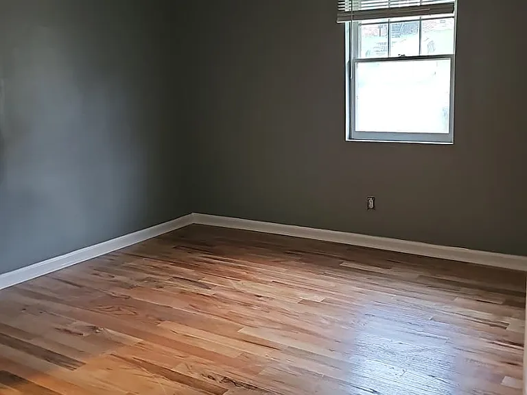 New hardwoods and fresh painted bedroom in bedroom 1