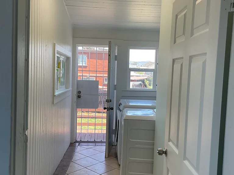 Laundry room to the backyared
