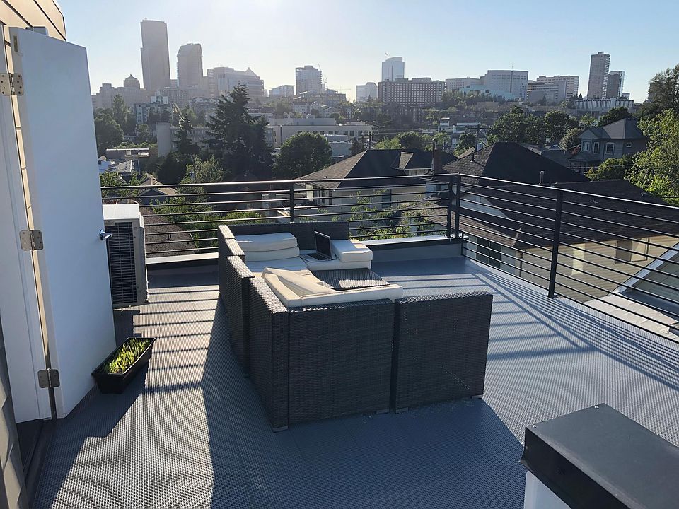 Rooftop deck with view of downtown Seattle skyline