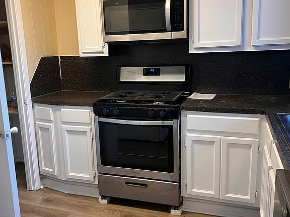 More Kitchen, Pantry and fridge to the left