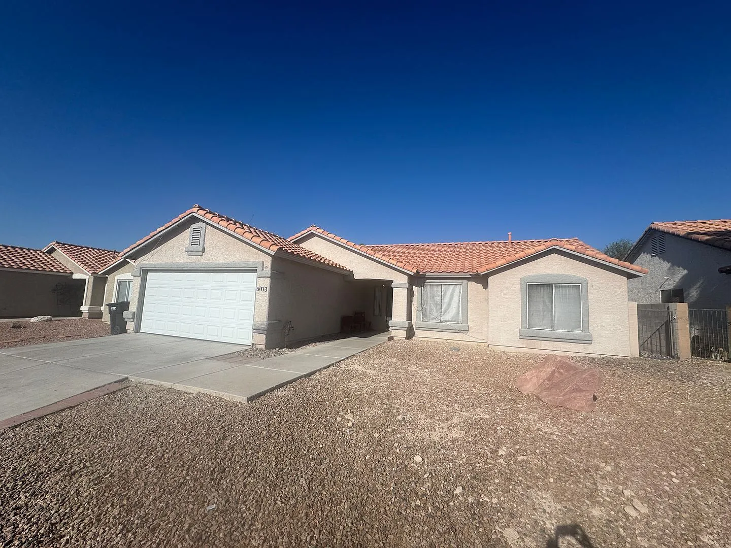 single-story home features 3 bedrooms, 2 bathrooms, and approximately 1,462 sq. ft. — Photo 1