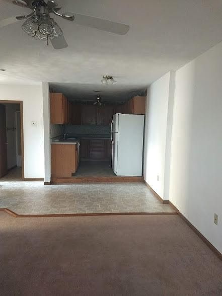 VIEW FROM LIVING ROOM TO THE KITCHEN AREA