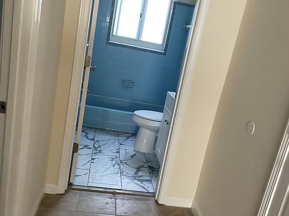 Newly renovated bathroom with tile