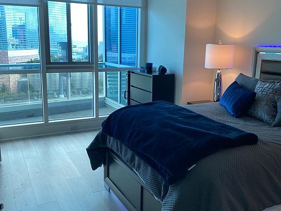 master bed with strip views
