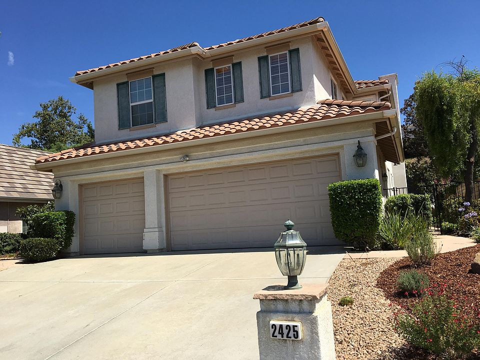 3 car garages and drive way.
