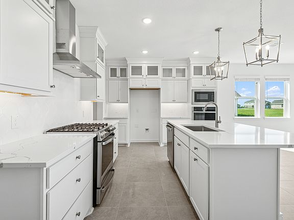 Kitchen with stainless-steel appliances wall oven
