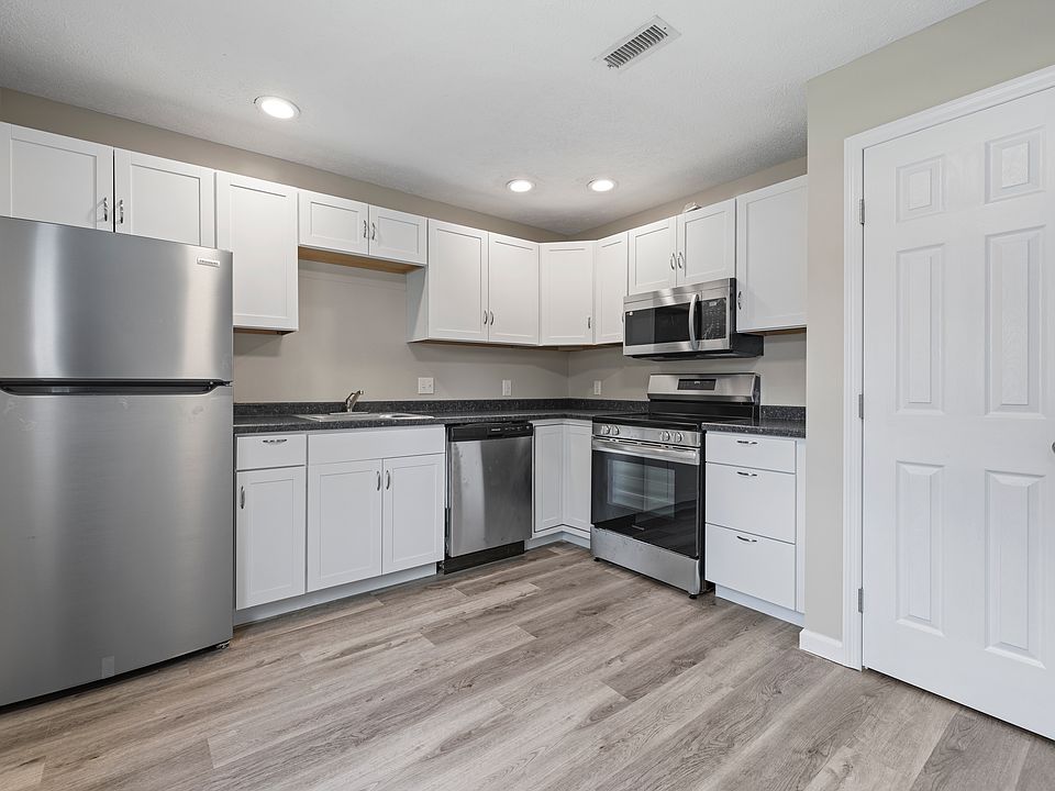 Updated kitchen with modern appliances.