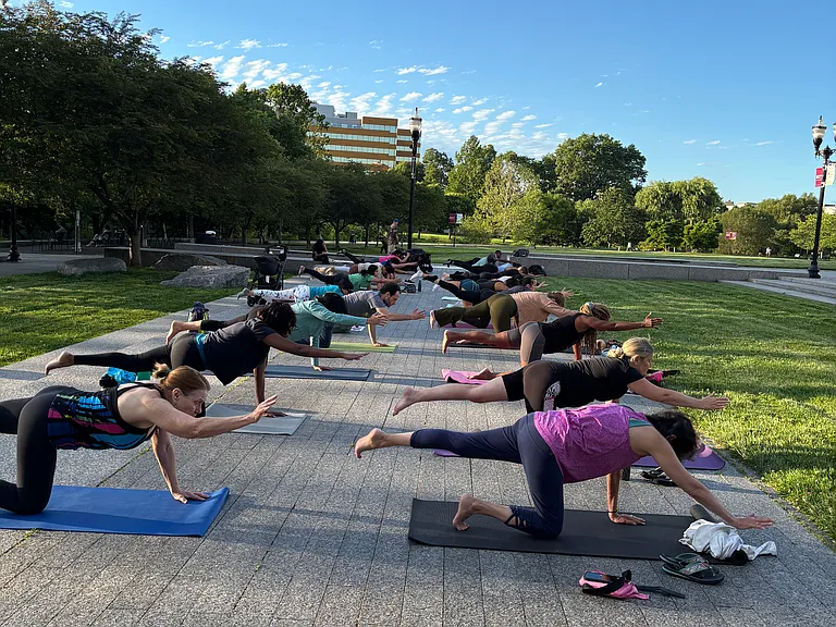 Photo Courtesy Mill River Park. Sunrise Yoga in the Park
