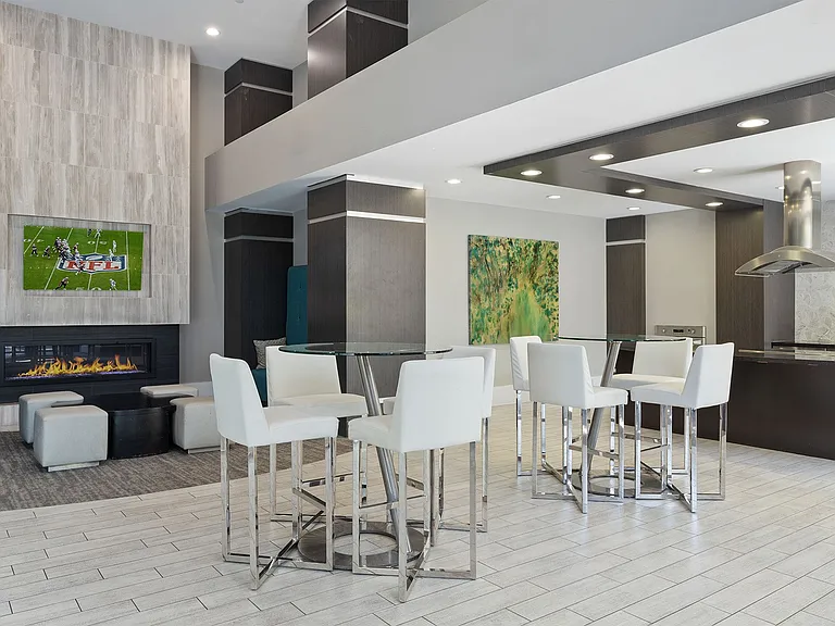 The two-story clubhouse includes a fireplace and entertainment kitchen