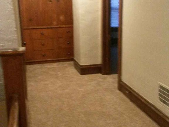 Upstairs hallway with storage