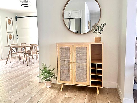 Decorative bar cabinet for wine glasses and more.