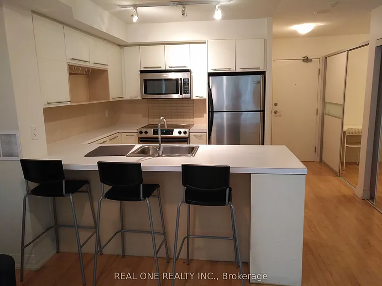 21 Carlton St #306 — Photo 1