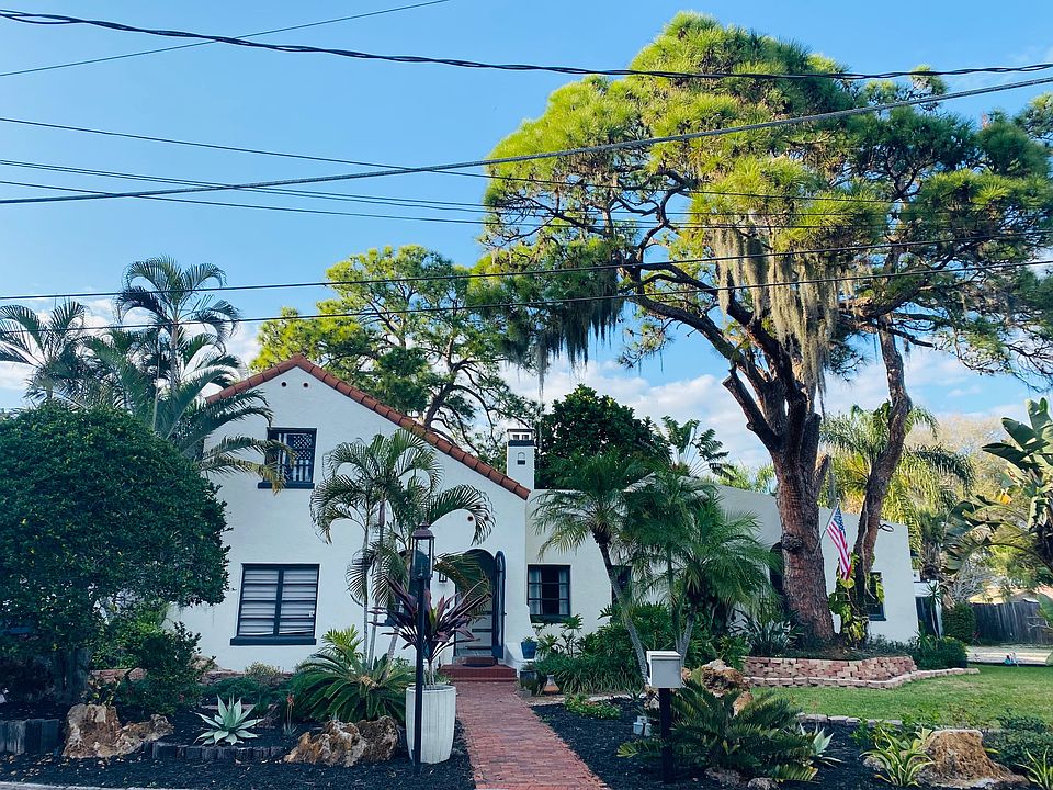 Beautiful Spanish Revival home built in 1927 and designed by famous architect Thomas Martin.