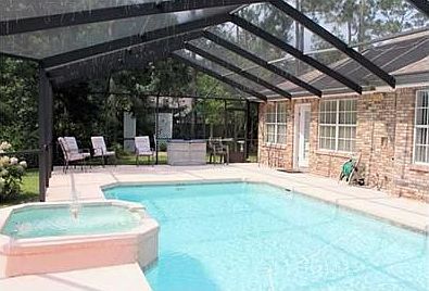 Gunite pool features a fountain spa