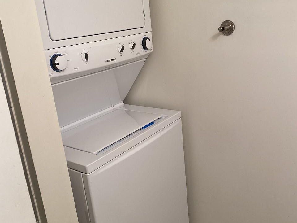 WASHER AND DRYER LOCATED IN DOWNSTAIRS BATHROOM