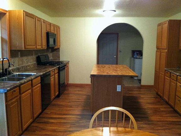 Kitchen looking into Laudry