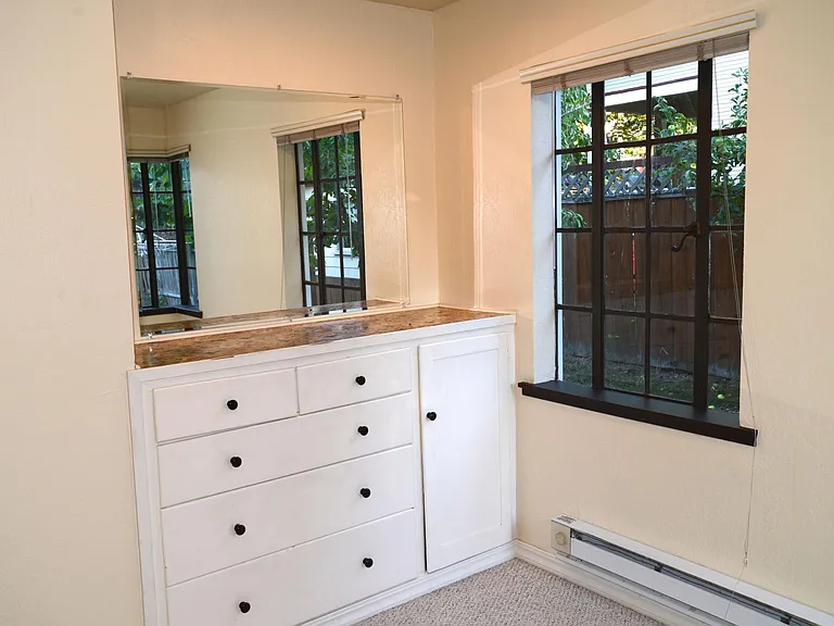 Detail of mirrored built-in bureau.
