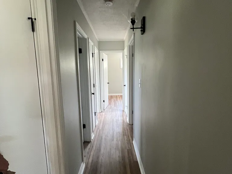 Hall from Kitchen and Living Area to Bathroom and Bedrooms