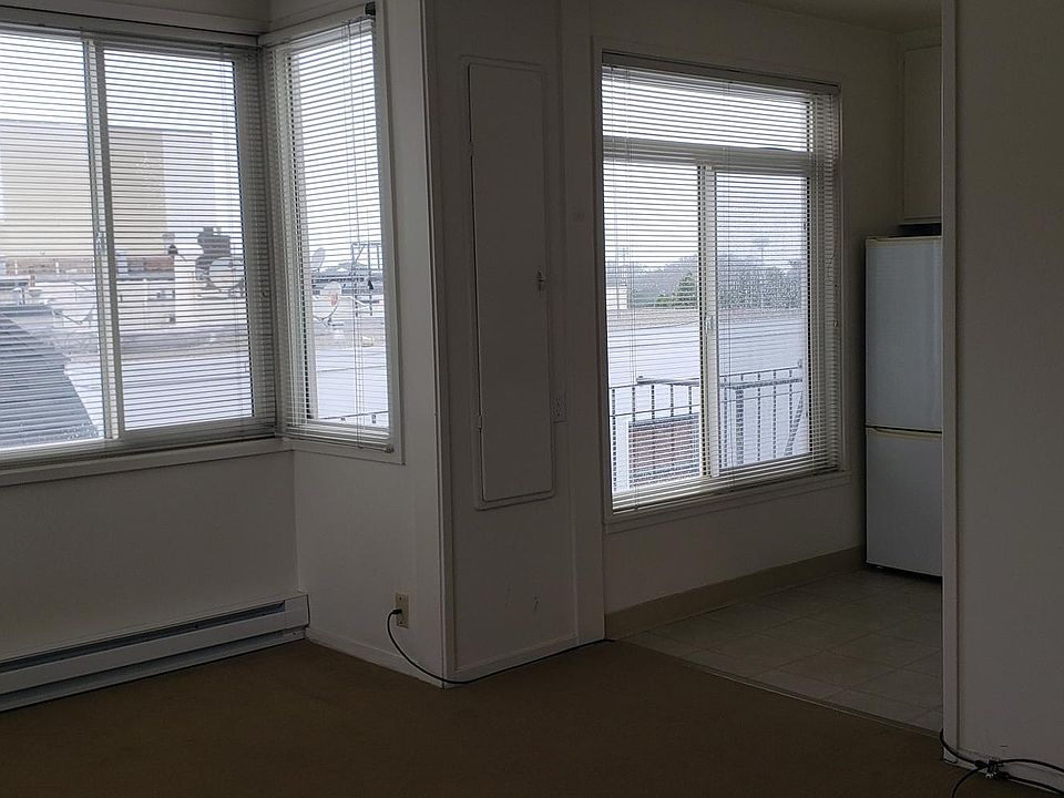 very sunny living room 3rd floor corner unit