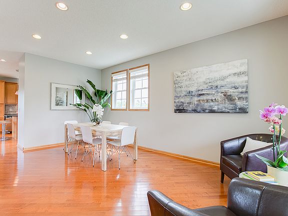 Sunny living & dining rooms.