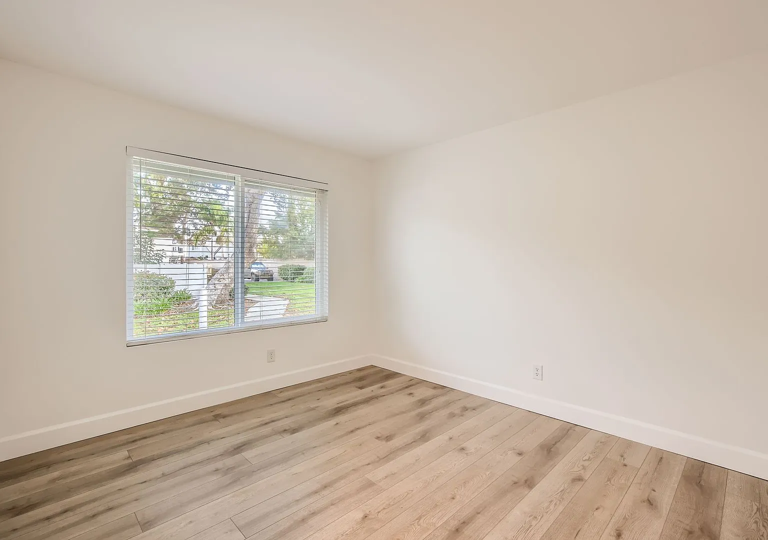 Recently Renovated!! - 3 Bedroom/2 Bath First floor corner unit with 2 car garage and A/C — Photo 3