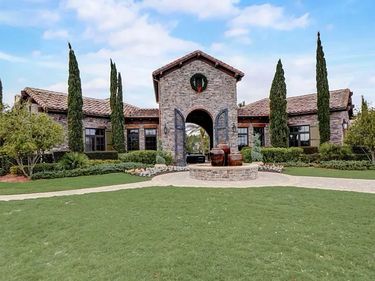 resort style club house entrance at the beginning of the community