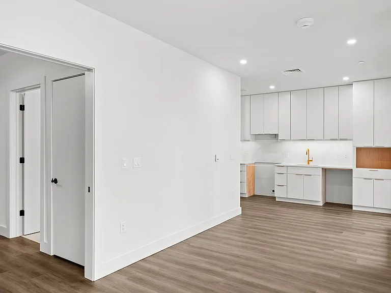 Unit 514 Living Space with Kitchen Views
Appliances are included but not pictured.