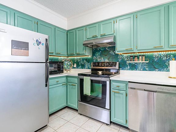 Full Size Refrigerator, Electric Stove, Counter Microwave and Washer and Dryer in unit (Recently Replaced)