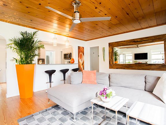 Open concept living room with connected dining room