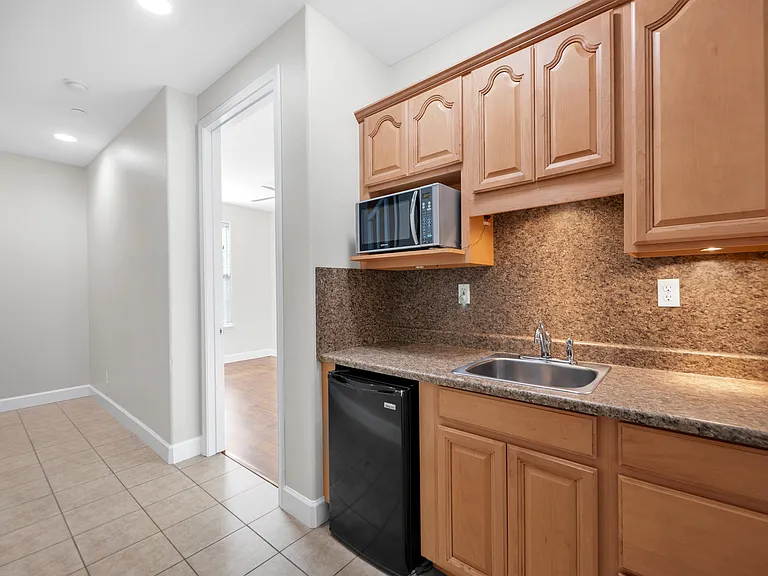 6143 Lonetree Blvd — Photo 19