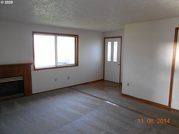 2nd image of 101 NE Coast Pine Ave