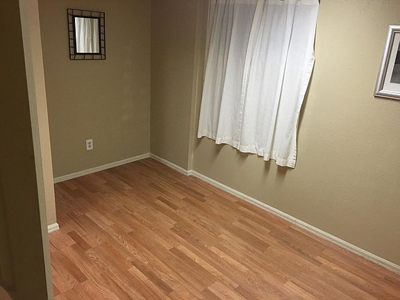 Basement bedroom New hardwood floor and fresh paint