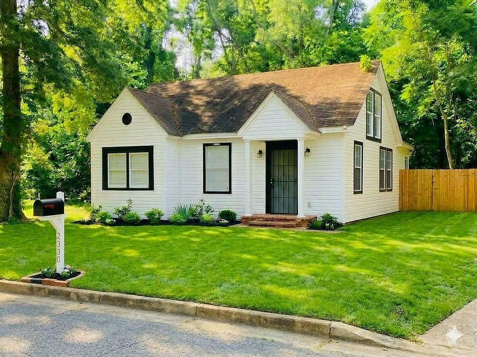 Front with privacy fence.